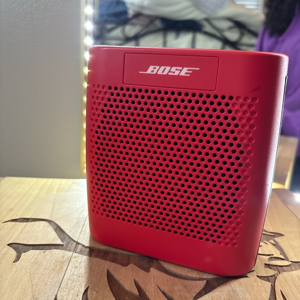Red Bose portable speaker
